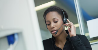 Customer support agent wearing a headset